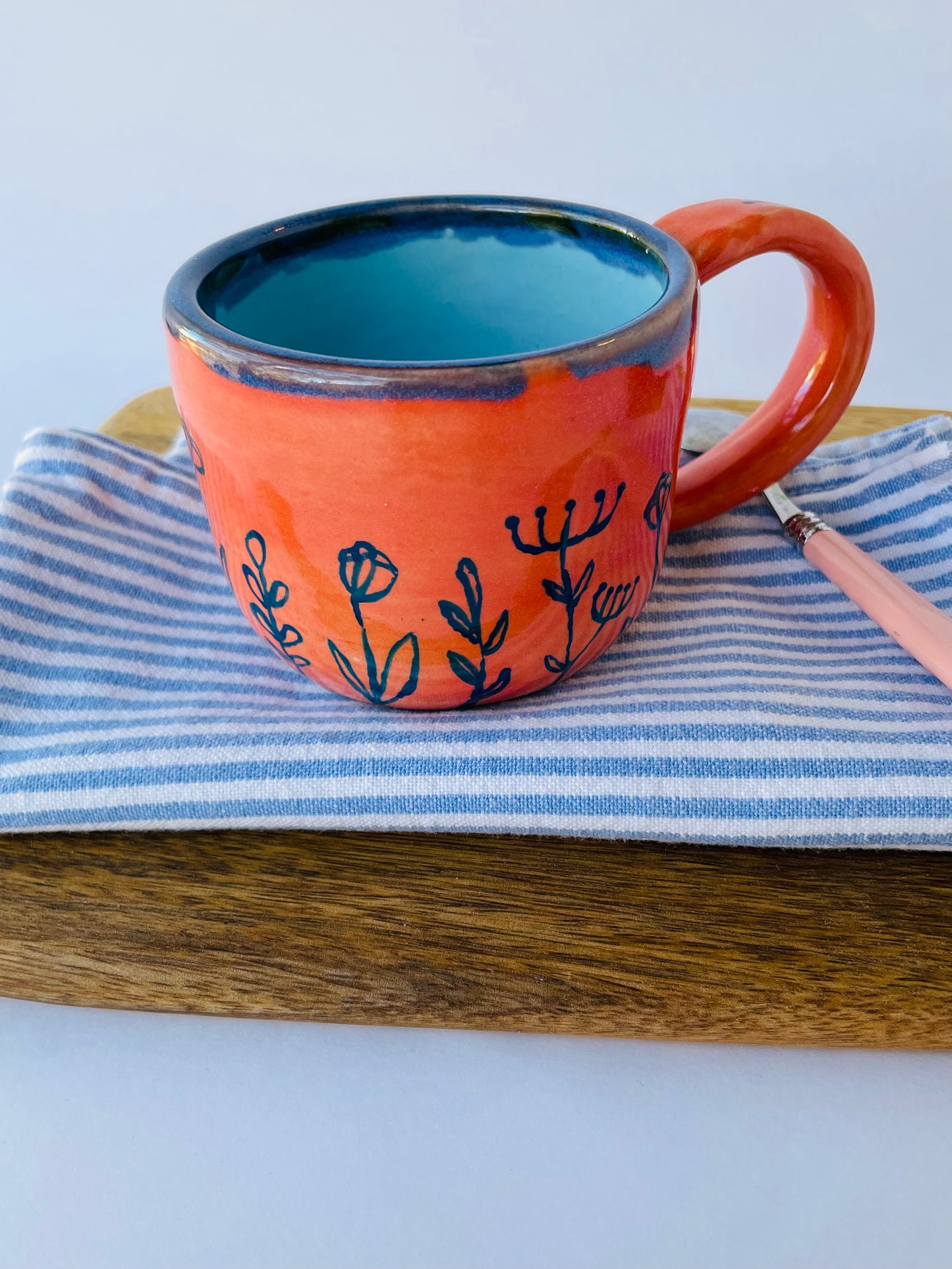 Coral Mug with Blue Flowers