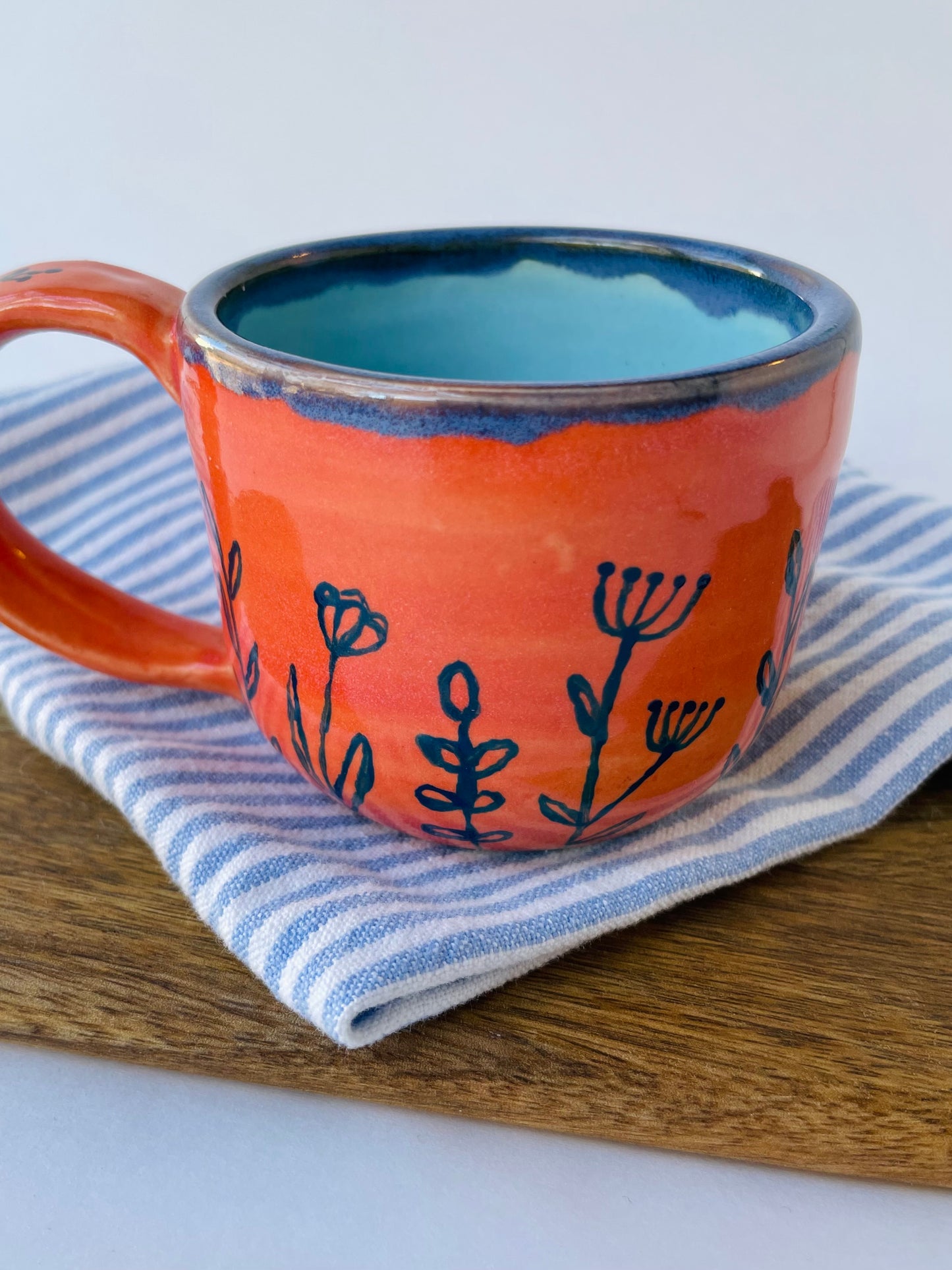 Coral Mug with Blue Flowers