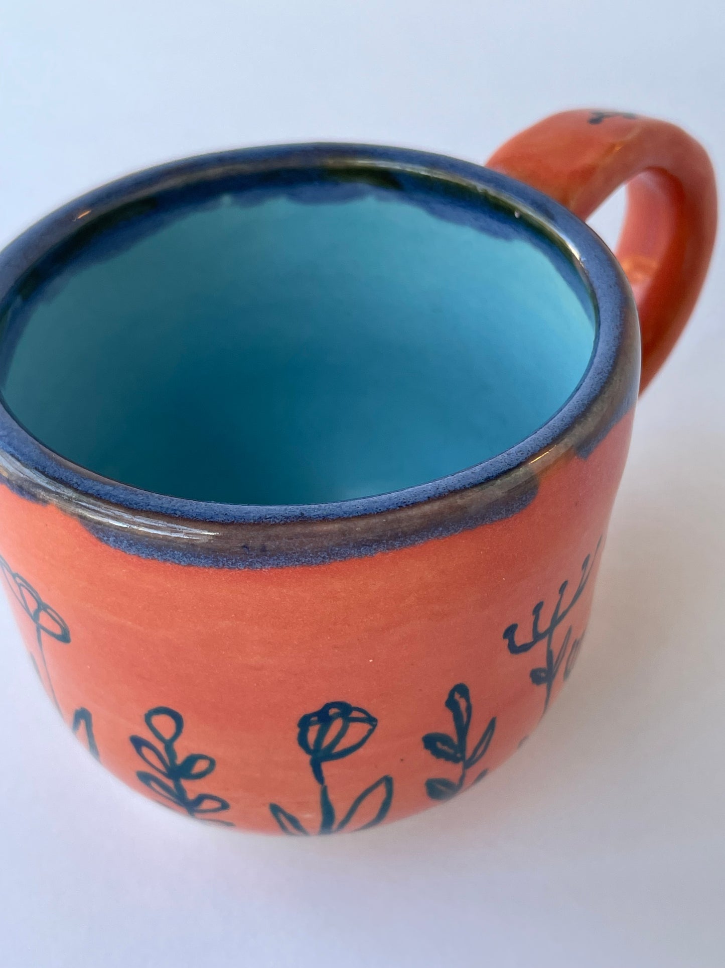 Coral Mug with Blue Flowers